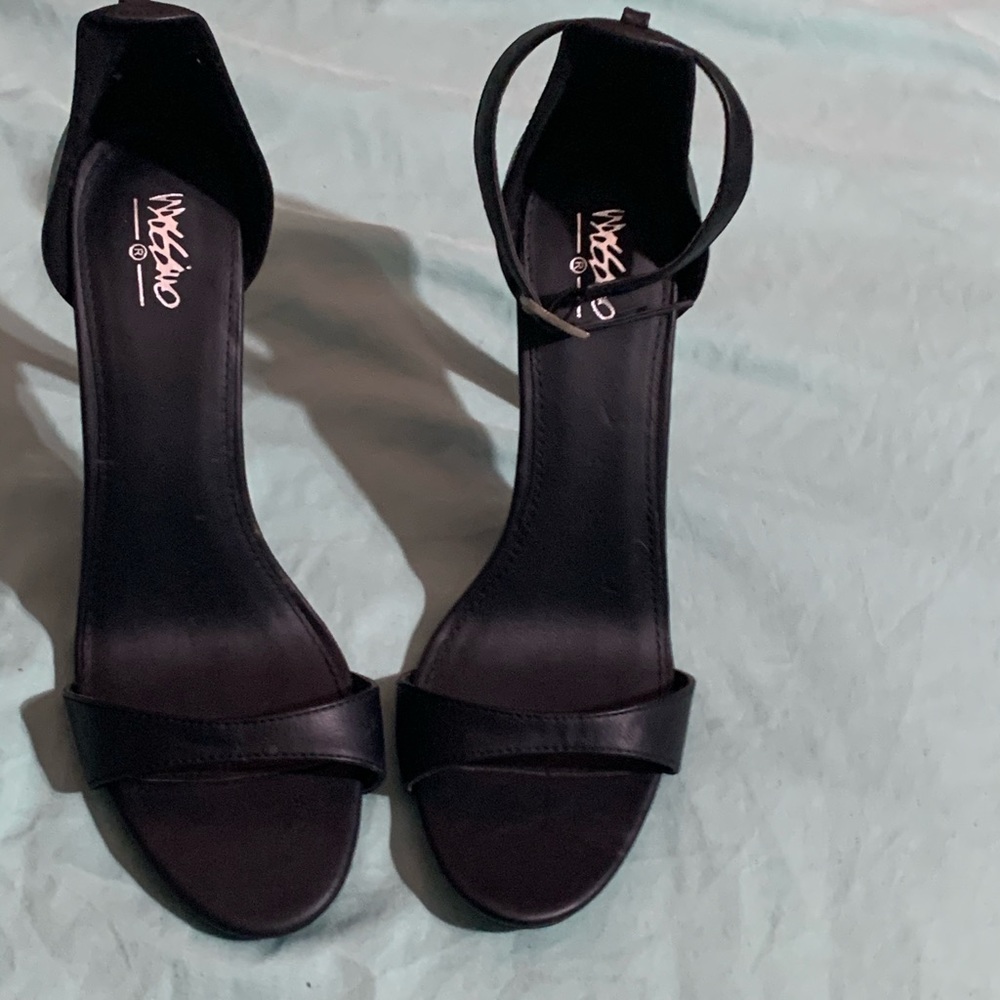 Black stiletto strappy heels